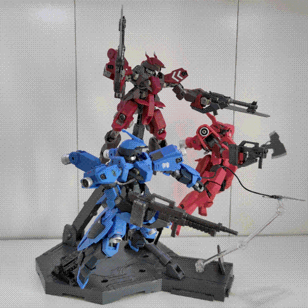 A photo of the three Graze models posed in the air on a big stand, this time viewed from the side. This shows the profile of the guns on the Schwalbe Custom more (including the attached blades/bayonets), as well as the shoulder thrusters on McGillis' Schwalbe and the Ryusei-Go.