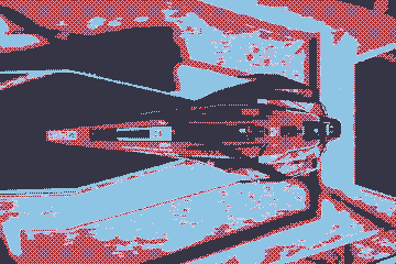 A heavily-dithered screenshot from wipEout 2048, showing an overhead view of the AG Systems Speed ship. The color palette is almost exclusively red and light blue.